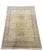 Large hand-knotted wool area rug by Safavieh featuring an intricate Persian-inspired Tree of Life and garden design. The...