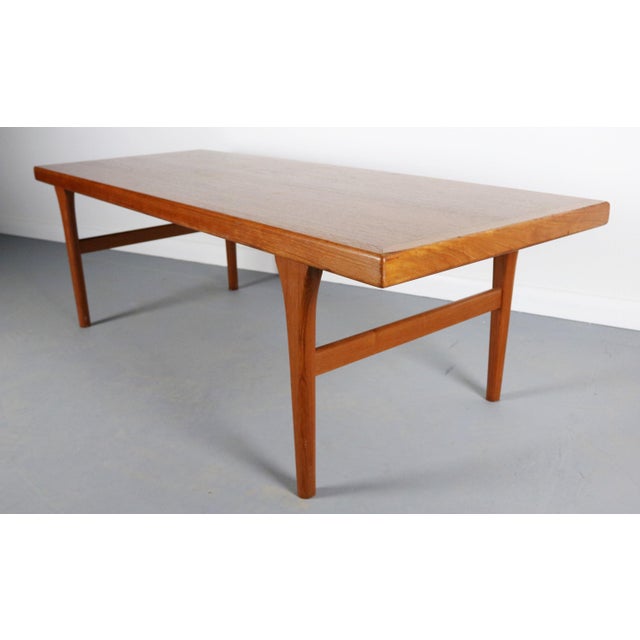 About this Danish Teak Coffee Table attributed to Johannes Andersen A stunning mid century modern low and long coffee...