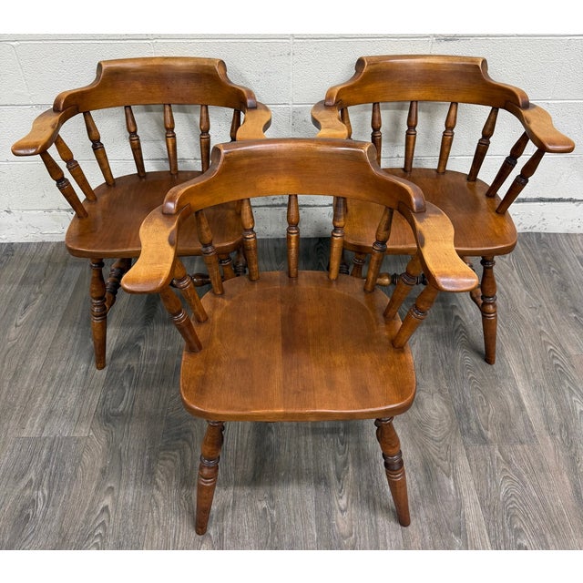 This is a gorgeous set of three vintage Sprague & Carleton Colonial Revival captain’s chairs or barrel back chairs crafted...