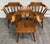 This is a gorgeous set of three vintage Sprague & Carleton Colonial Revival captain’s chairs or barrel back chairs crafted...