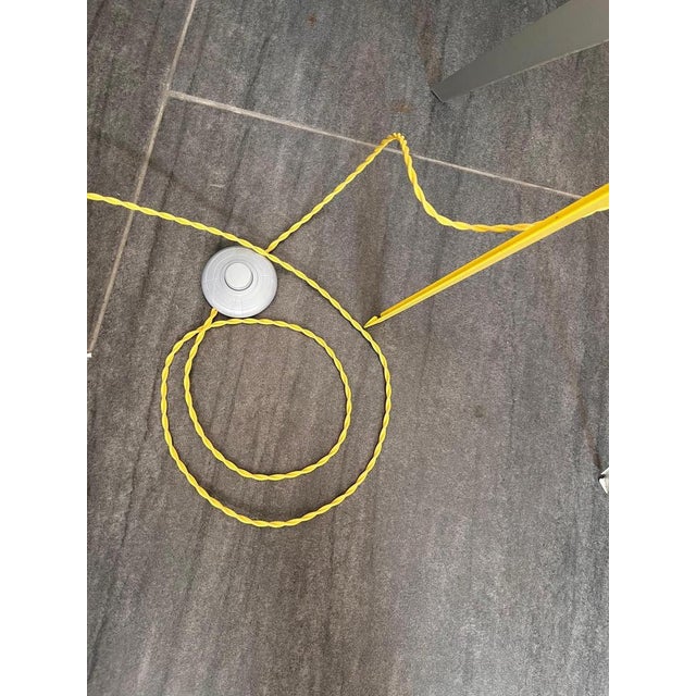 Floor lamp tibibi mod. D21 for luceplan, 1993 made of aluminum made in italy h: 185,5 cm dm: 13 cm resp. 40 cm good...