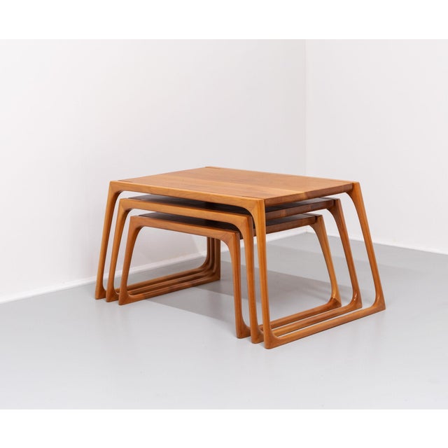 Vintage sculptural maple nest of three tables. These would have been finely crafted in a small British workshop. Made in...
