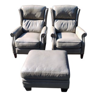 Elevate Your Living Space With This Exquisite Pair of Recliners & Matching Ottoman For Sale