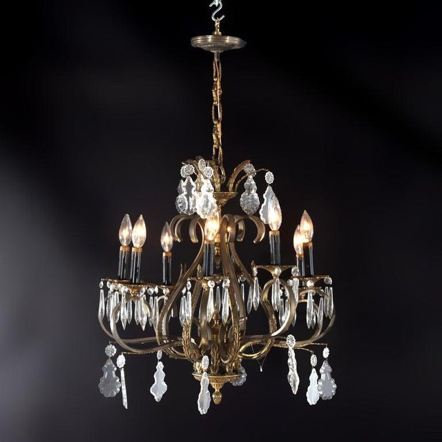Antique Bronze & Brass 8-Light Chandelier With Italian Cut Crystals c1930 Measures - 34 1/4" x 22" x 22" An elegant...