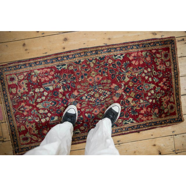 :: Covered field in floral sprays, blossoms, and bouquets, wrapped by a narrow banded meandering vine and minor blossom...