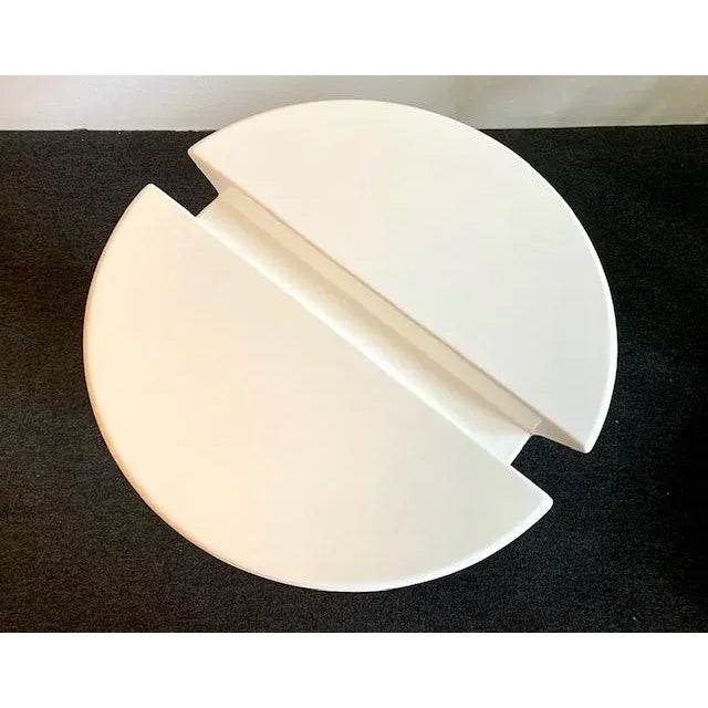 Eero Aarnio Screw Table. In 1990 Eero Aarnio was at home sitting in his famous ball chair design and longed for a nice...