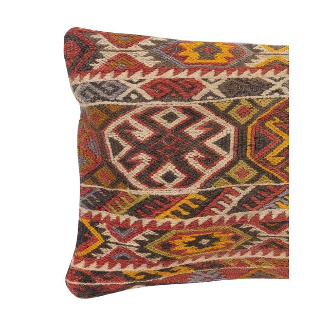 Add a touch of history and warmth to your space with this vintage handmade Turkish wool kilim cushion cover. Crafted from...