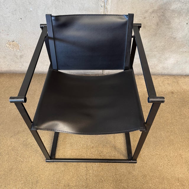 An iconic piece of Dutch architectural minimalism, this postmodern "Kubus" (Cube) FM60 armchair was designed by Radboud...