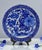 This striking antique Japanese Arita porcelain charger showcases a traditional blue-and-white hand-painted design...