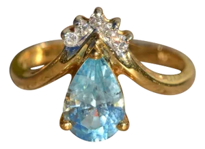 Th Cerulean: Teardrop Topaz and Diamond Ring in 14 K Gold