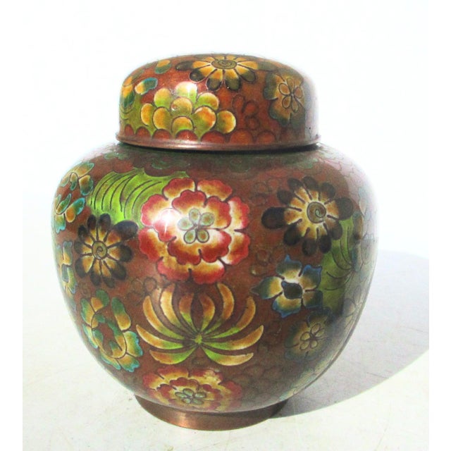 Antique Chinese enamel ginger jar. Hand-written script in the enamel on the underside CHINA. Completed in shades of brown...