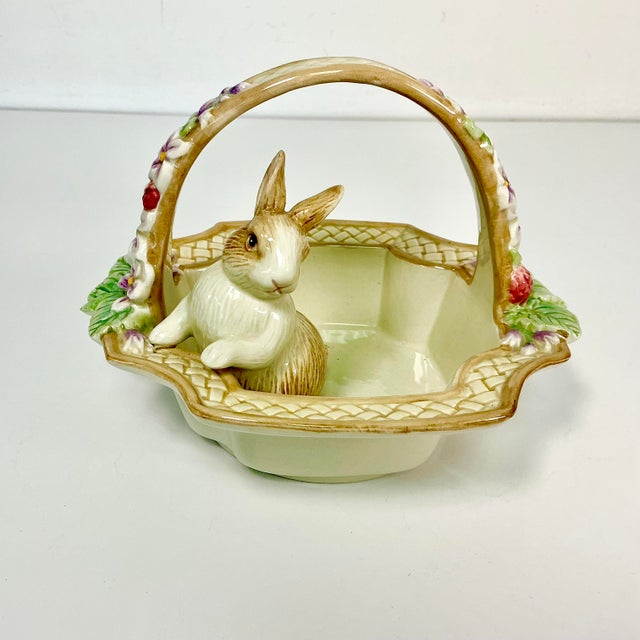 This is a whimsical Easter Jelly Bean Bowl. It features a ceramic basket style bowl with spring flora accents. Inside the...