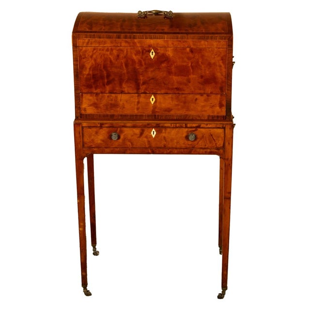 A remarkable flame mahogany Neoclassical Robert Adam style chest on stand, attributed to Ince and Mayhew, London, circa...