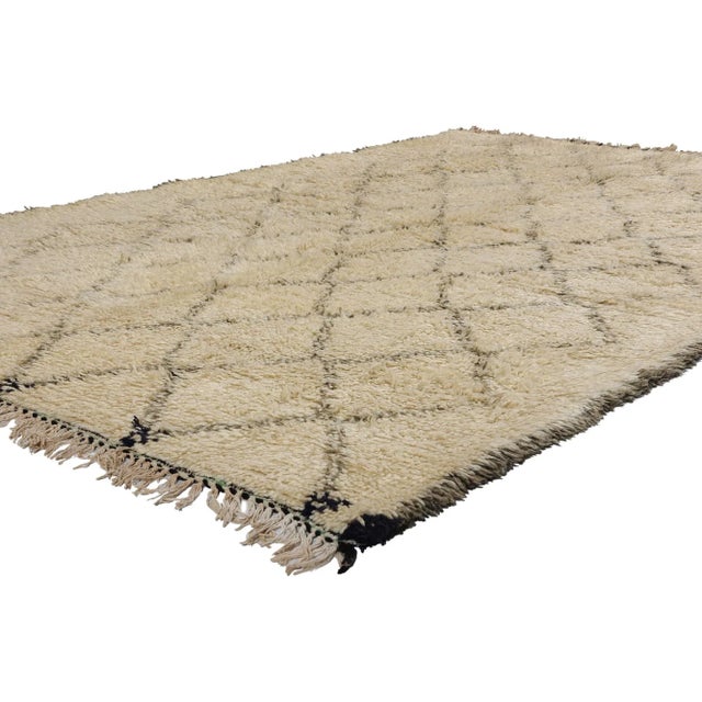 21769 Vintage Moroccan Beni Ourain Rug, 05'02 x 07'10. Hailing from the esteemed Beni Ourain tribe in Morocco, these...