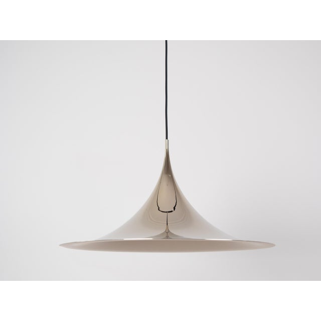 The Semi lamp was designed in 1968 as the result of a creative partnership between Claire Bonderup and Torsten Thorup....