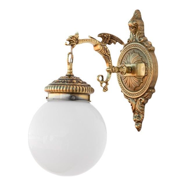 1960s Spanish Gothic Gold Brass Winged Griffin Wall Sconce With Opaline Glass Globe For Sale