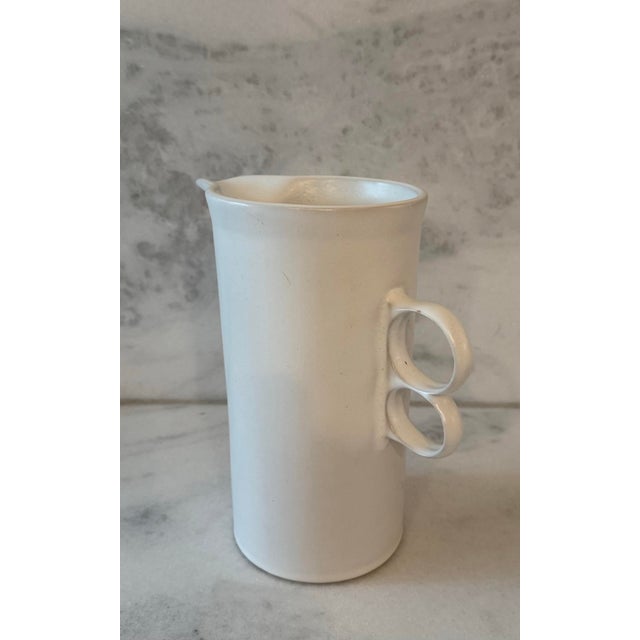 Vintage mid century tall white ceramic pitcher with trigger handle by David Gil Cooperative Design for Bennington Potters....