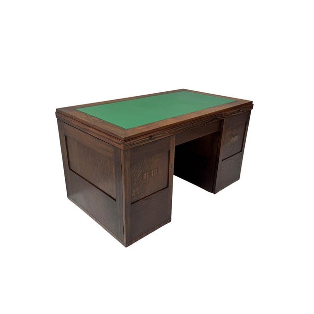 Magnificent and rare Art Deco Modernist desk with matching armchair. Design in the style of Frits Spanjaard. Striking...