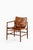 Armchair in teak and leather by kai lyngfeldt larsen, 1957 additional information: material: teak and leather style: mid...
