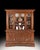 Crafted in Italy from solid walnut, this antique china cabinet combines impressive scale with practical storage. The upper...