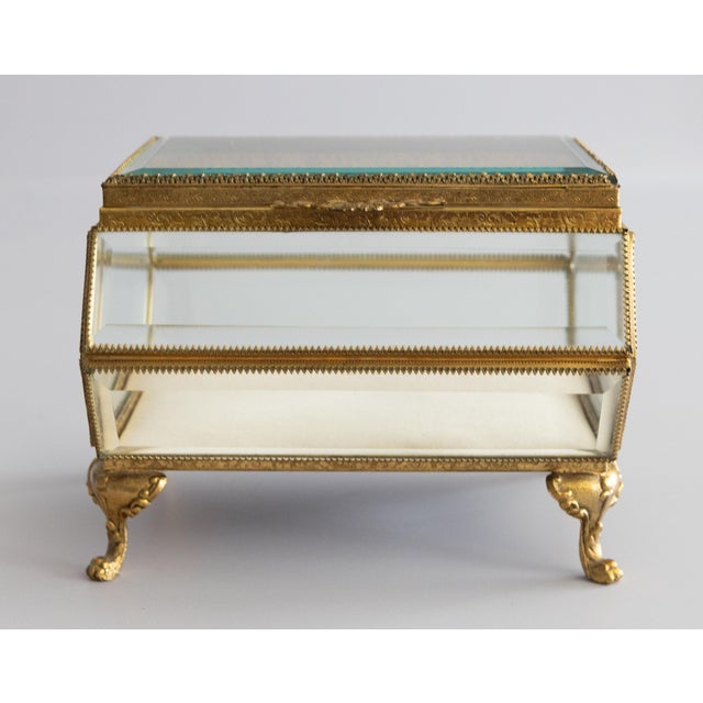 A stunning antique French brass ormolu beveled glass footed jewelry casket or dresser box with hinged lid and lovely bow...