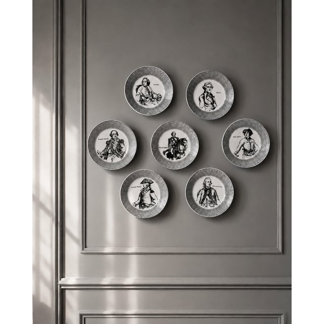 A group of seven porcelain coasters from piero fornasetti’s “americana” series, designed and produced in milan in the...