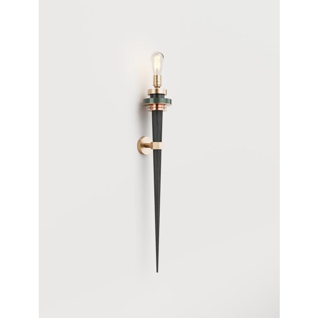 Torca ii wall lamp in solid brass and oxidized wood by studio marine breynaert. Dimensions: w 12 x d 14.5 x h 82.5 cm....