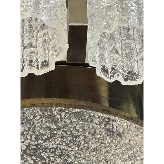 Mid-20th Century Barovier & Toso chandelier. Supporting structure in bronze-coloured chromed metal, a large glass plate...
