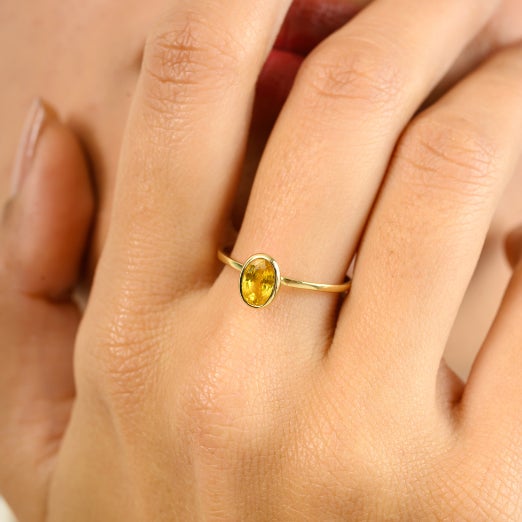 Natural Erudite Yellow Sapphire Dainty Women Solitaire Ring in 14k Yellow Gold featuring natural yellow sapphire of 0.78...
