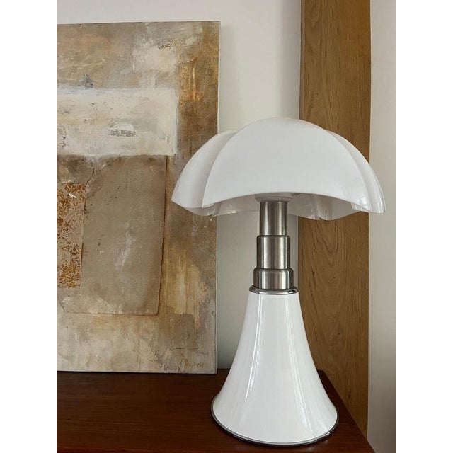 White Pipistrello lamp by Gae Aulenti for Martinelli Luce. The design dates from 1966; the production year of this...