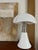 White Pipistrello lamp by Gae Aulenti for Martinelli Luce. The design dates from 1966; the production year of this...