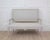 A refined Gustavian style settee dating to circa 1900 and featuring elegant neoclassical lines inspired by classic Swedish...