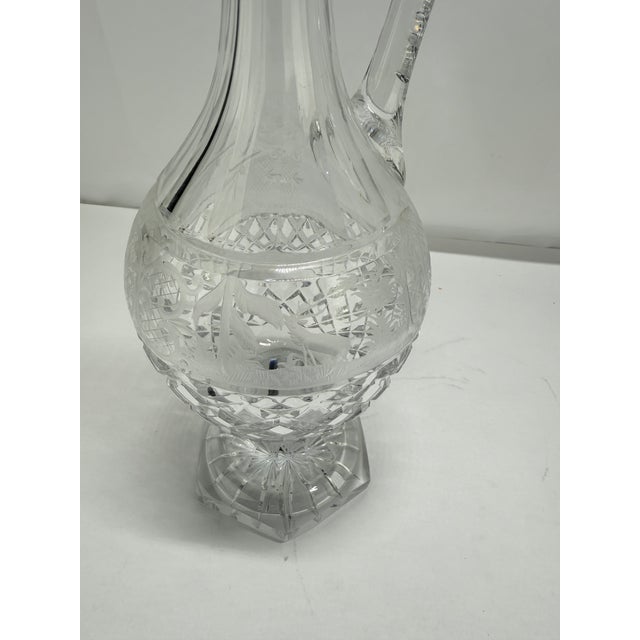 Late 19th–early 20th century Continental crystal claret ewer with engraved game frieze, probably Val Saint-Lambert...