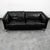 High quality early black leather Danish modern 2 seater sofa / couch by unknown maker .This piece was imported directly...