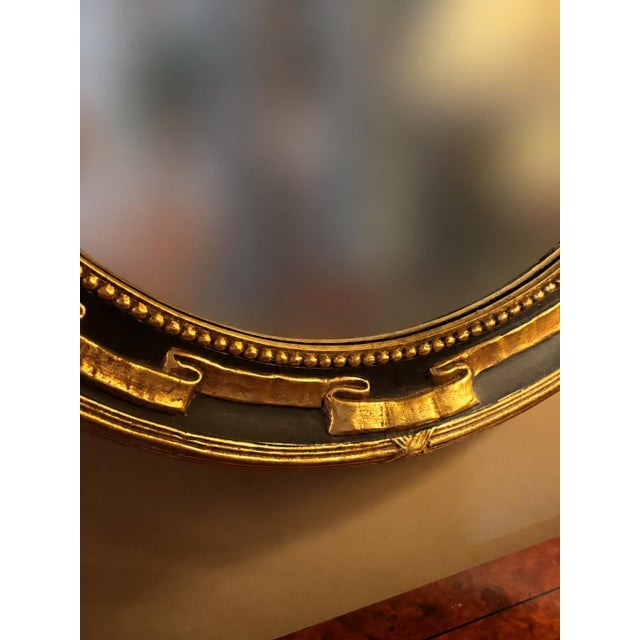 Neoclassical Vintage Federal Revival Black and Gold Parcel-Gilt Oval Wall Mirror For Sale - Image 3 of 6