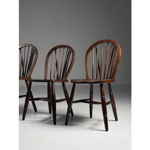 Set of 4 Windsor dining chairs. 85H x 48D x 41W cm