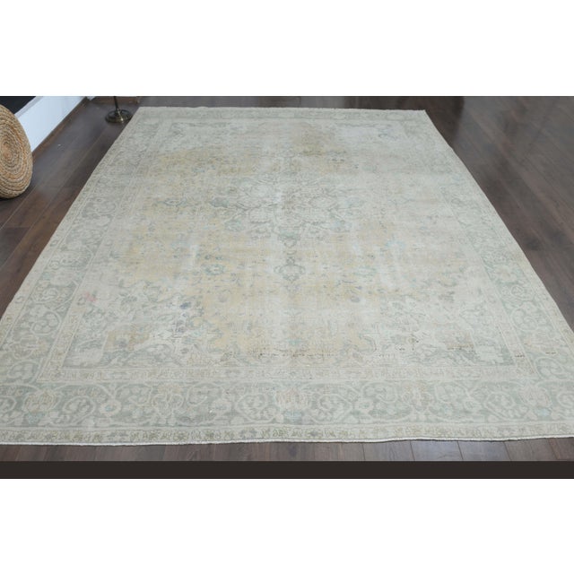 Vintage Persian Hand-Knotted rug is a semi- vintage oversize area rug.'70s Eastern region of Middle East's unique rug is...