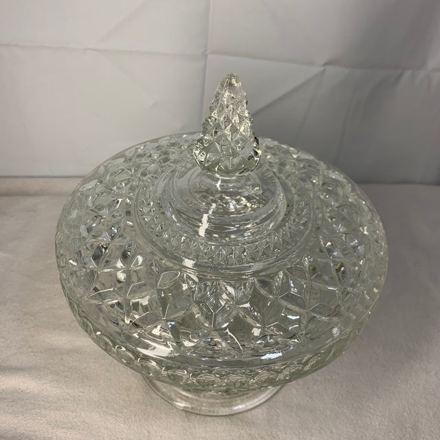 This is a vintage clear pressed glass lidded candy dish featuring the classic Wexford diamond criss-cross pattern produced...