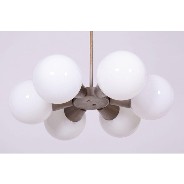 Maker: Kamenický Šenov This original six-arm pendant chandelier called Sputnik, originating from the 1960s, represents an...
