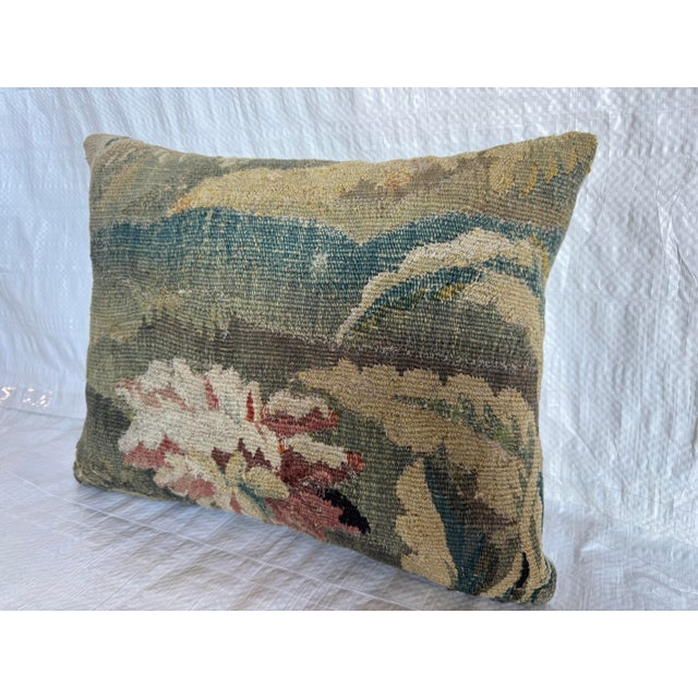 This pillow is made from an authentic 17th century Flemish tapestry fragment, originally woven by hand in Flanders during...