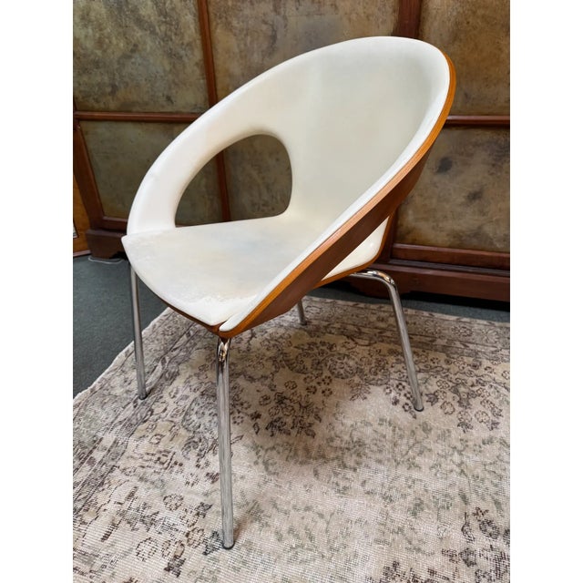Design Plus Gallery presents a Kirkos Chair by Wolfgang C.R. Mezger for Davis Furniture. The chair has an iconic shell...