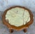 19th green onyx fleur form top coffee table with six oak legs.