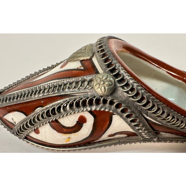 A hand painted ceramic Moroccan slipper with silver/nickel filigree. From the city of Fez or Fes in Morocco. Marked FES H...