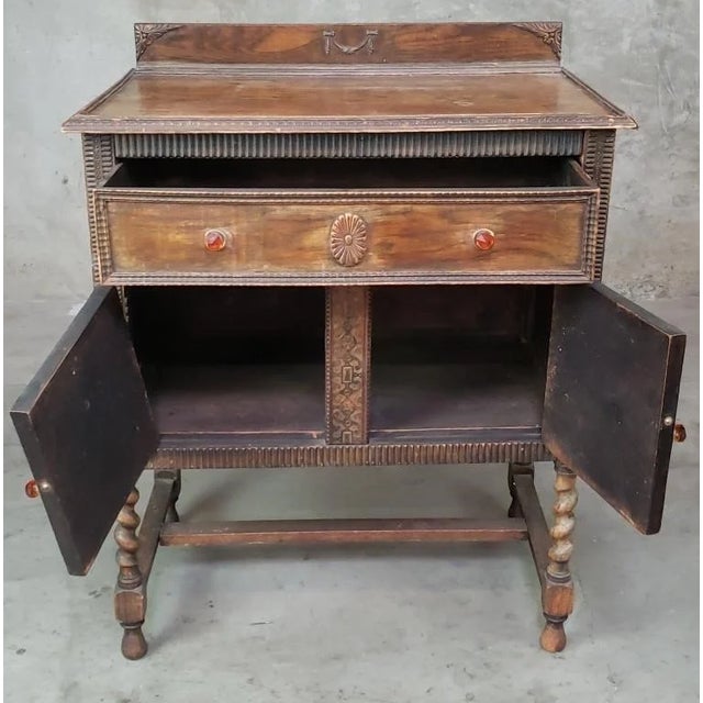 Gorgeous Cabinet in Good Vintage Condition. Solid and Firm. There is wear to the finish. Please study the photos and ask...