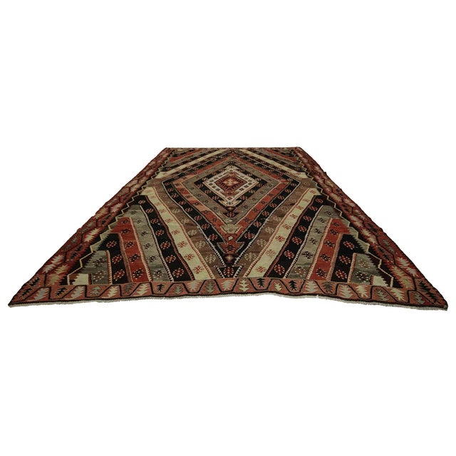 Large vintage handwoven kilim rug from Sivas region of Turkey. Approximately 60-70 years old. In very good condition.