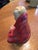 This Royal Doulton figurine is a little blond haired boy wrapped in a red blanket. He is called This Little Pig. The mark...
