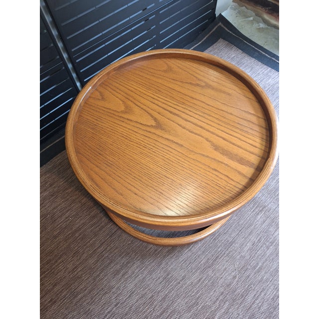 Round solid oak table Have included pictures from all around the table. Matching coffee table and crescent shape side...