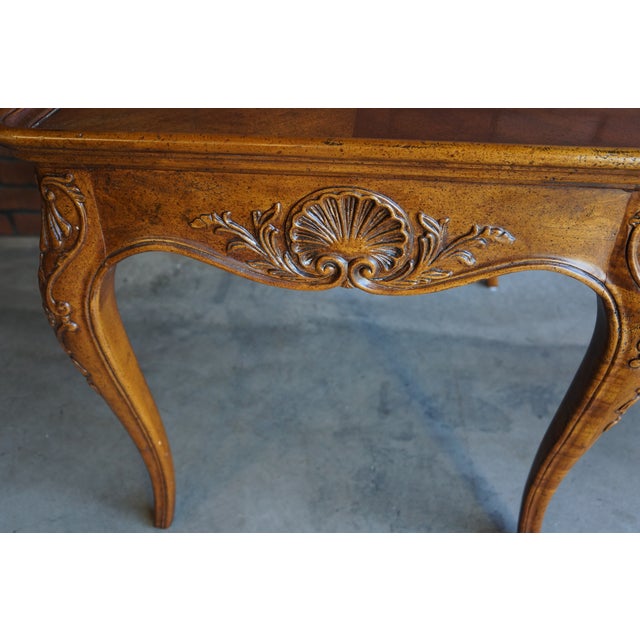 Welcome the classic ideas of French exquisiteness reminiscent of a French Chateau. This French Provincial styled end table...