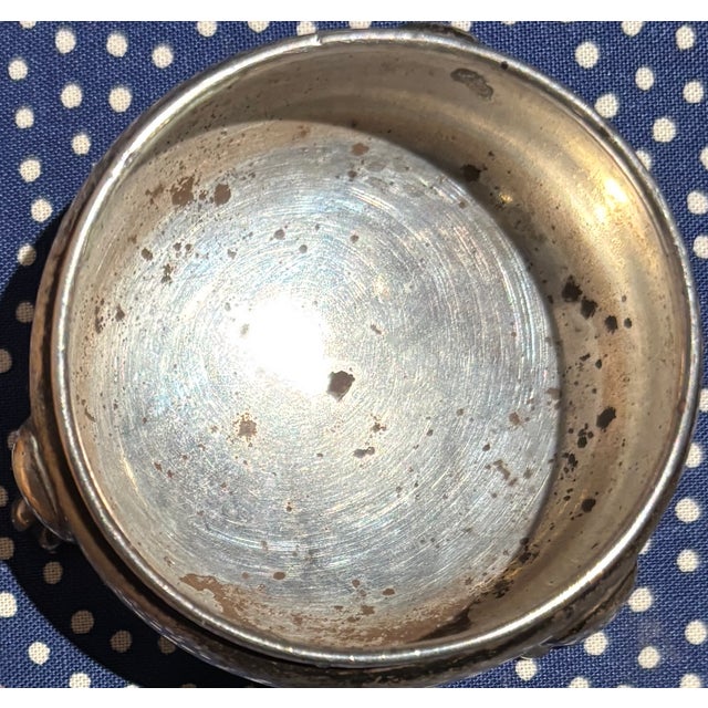 Charming early 20th-century silver figural salt and pepper Shakers, accompanied by a matching open salt cellar with...