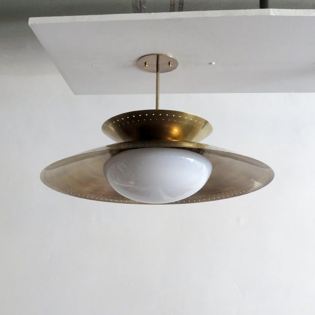 wonderful ‘Lily’ chandelier designed by Gallery L7, handcrafted and finished in Los Angeles from American brass, with an...